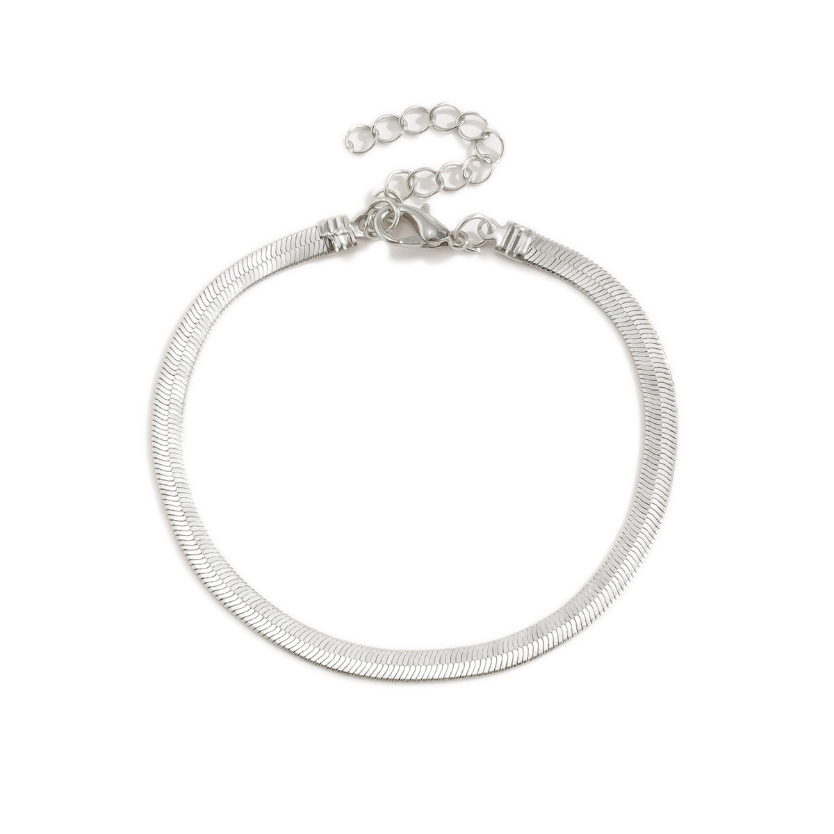 Snake bracelet in silver on a while background from Aurie Jewelry.