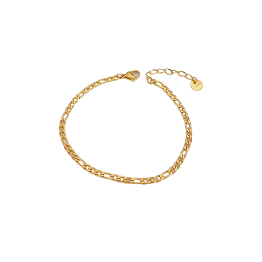Gold cuban chain bracelet on a white background - from Aurie Jewelry essentials collection 
